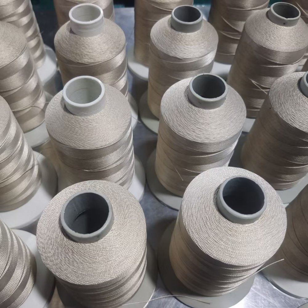 Hilo de coser de fibra de vidrio recubierto de PTFE: tamaño de aguja, tensión y rotura